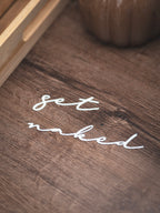 "get naked" Schild zum kleben | in verschiedenen Farben und 2 Größen